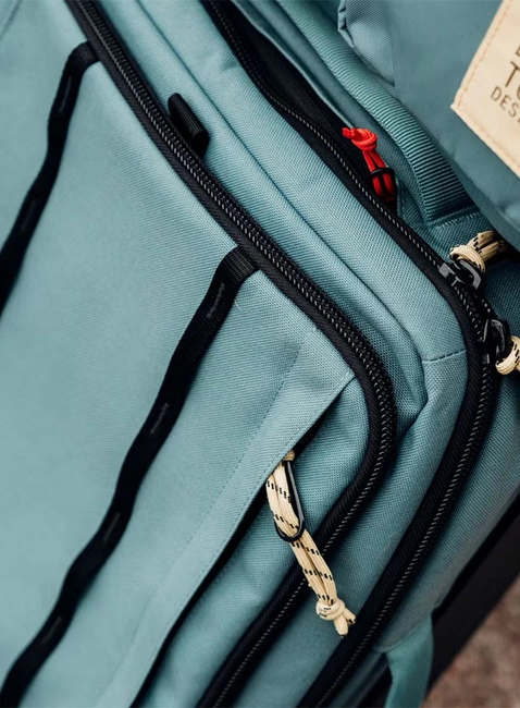 Torba / plecak na kółkach Topo Designs Global Travel Bag Roller - pond blue / spice