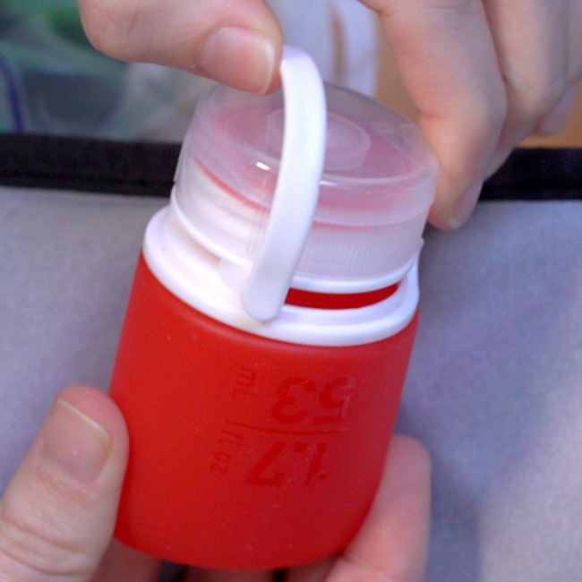 Podróżna silikonowa butelka na płyny do samolotu Humangear GoToob+ L - clear