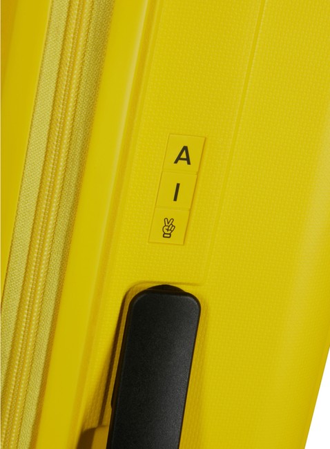 Walizka kabinowa American Tourister Rejoy - electric yellow