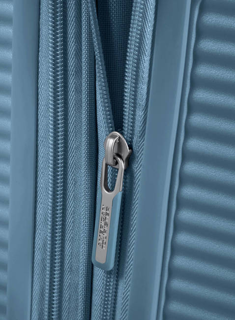 Walizka średnia American Tourister Soundbox EXP - stone blue